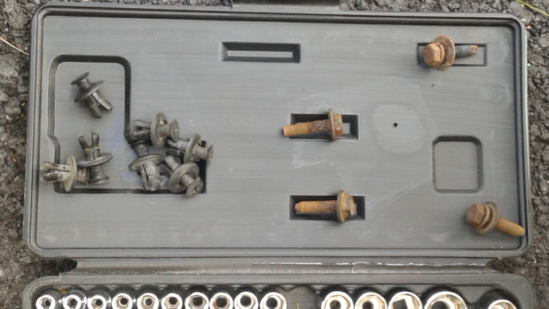 2:55pm - Feel proud, pat yourself on the back and marvel at the clips and screws you just removed while thanking the car gods none of the bolts were rusted from the oceans of salt the Nova Scotia Dept. Of Transportation uses on the roads every winter...